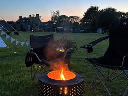 Evening by a fire with one of the fire pits provided by the campsite