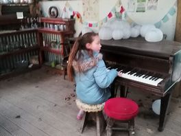 Playing piano in the games room