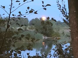 Full moon rising just before dark