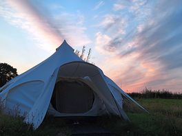 Beautiful evening sky behind the tent