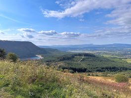 View from peak behind the site