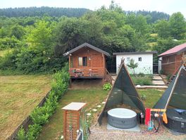 Our bungalow with toilet building on the side. we really enjoyed our stay.