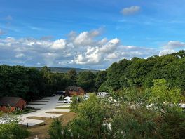 Tree trail walk overlooking the site accessible at the entrance up a small set of steps.