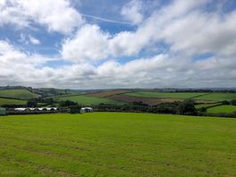 The rolling hills around.