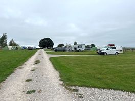 View of site from toilet block. hardstanding pitch 6 closest.