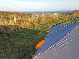 View from tent of milford haven shopping channel behind
