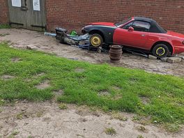 Car graveyard at entrance