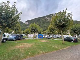 Pitches and mountain behind.