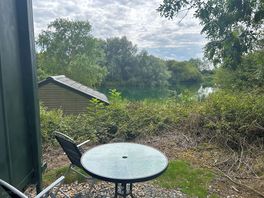 Table and chairs outside kitchen