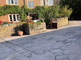 The stunning farmhouse which is also the reception for camping!