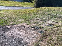 Significant drop between hardstanding and grass