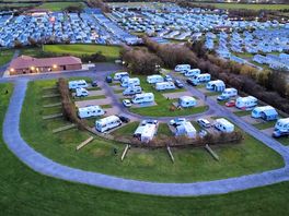 Drone shot towards site.