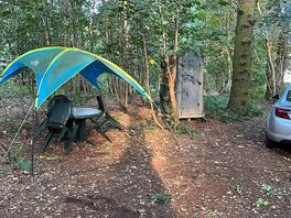 Toilet and under cover seating area