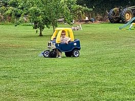 Our little man enjoying himself with one of many ride on to play with