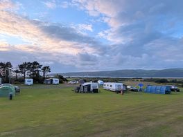 Campsite from the highest point, standing in front of a row of caravans.