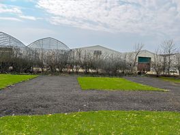 Electric hardstanding and grass touring pitch