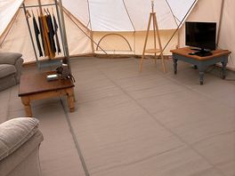 Each family bell tent had a separate tub area and slept up to 12 people