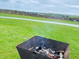 You can buy firewood directly at the campsite, and they also provide fire pits.