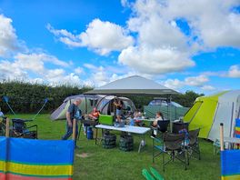 4 tents and a gazebo. plenty of space good sheltered spot