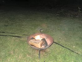 They supply the fire pit, £6.50 for a bag of logs