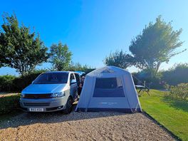 Van and a 3x3m air shelter