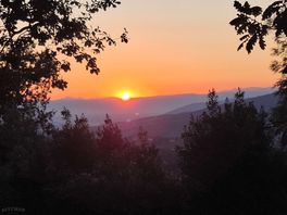 Couché de soleil vue des hauteurs du camping