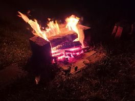 Camp fire, slate and blocks provided to keep the grass from burning, wood available from host