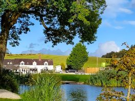 Looking at the cafe and reception from the coarse fishing pond