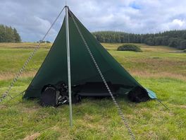 Tarp on tent pitch