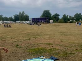 View from lake side looking towards restaurant area / musical festival