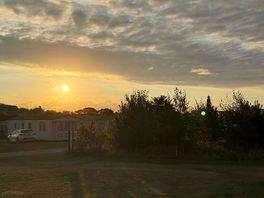 Sunset lighthouse view pitch 15a/b