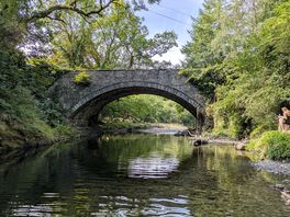 Take a dip in the river next to the site!