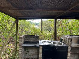 The private kitchenette area with water & built in bbq