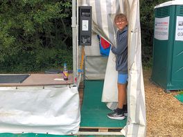 Shower and washing up station. three toilets with sinks in next field across