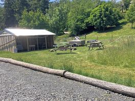 Pizza area/communal camp fire and hut is where the shop is