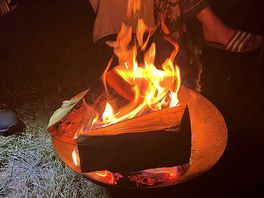 Campfire at night - you can buy logs on site.