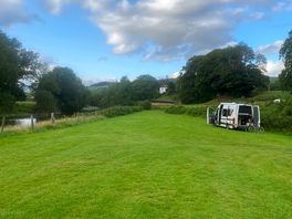 Good firm grass that is level.