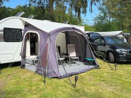 Awning, van and car space.