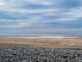 An hour long walk from site to beach.
