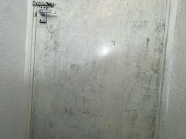 Back of toilet door, mouldy