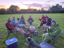 Our group eating pizza at sunset!