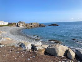 Rocky beach next to campsite