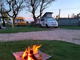 Open fires allowed if off the ground.