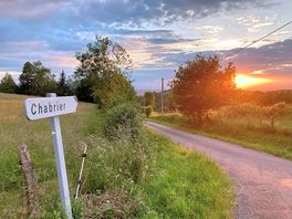 Sunset over road to entrance