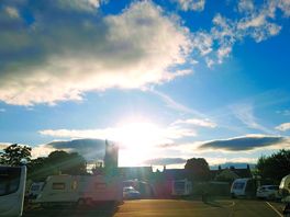 Sun setting over the site