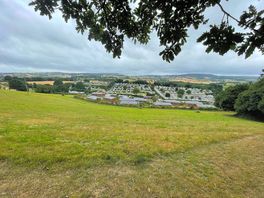 Walk over the fields behind the site, from dog walking field.
