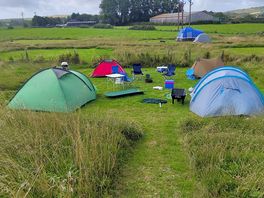 Our pitch, with four tents and fire pit