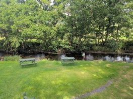Tent site next to stream.