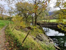 The shower trail past the yurts overlooking the river derwent