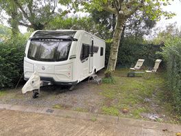 You could not park the car and open the door. we did have an awning...but, just no!